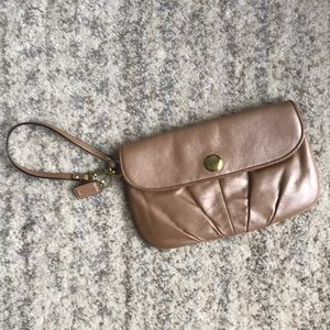 Iridescent nude pink Coach clutch